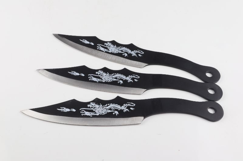 Photo 1 of LARGE DRAGON THROWING KNIVES NEW 