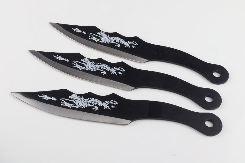 Photo 1 of SMALL DRAGON THROWING KNIVES NEW 