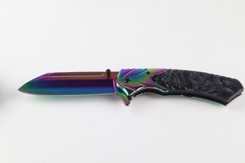 Photo 2 of OIL SLICK POCKET KNIFE NEW 