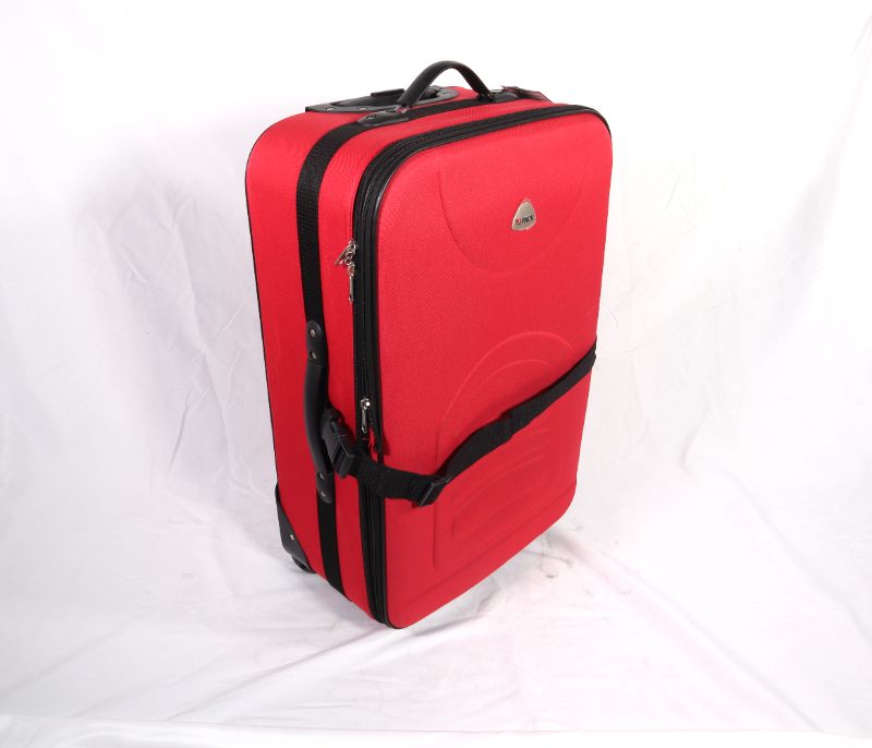 Photo 1 of HI PACK RED 24 INCH SUITCASE INLINE WHEEL EXPANDS AND A STRAP TO CLIP AROUND FRONT NEW $69.99