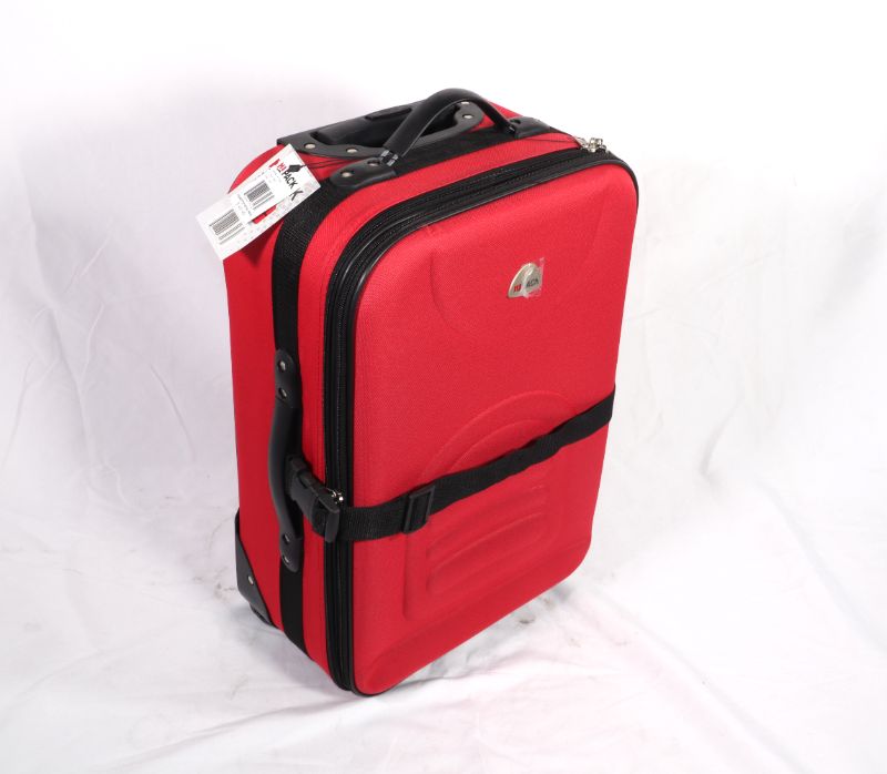 Photo 1 of HI PACK RED 20 INCH SUITCASE INLINE WHEEL EXPANDS AND A STRAP TO CLIP AROUND FRONT NEW $49.99