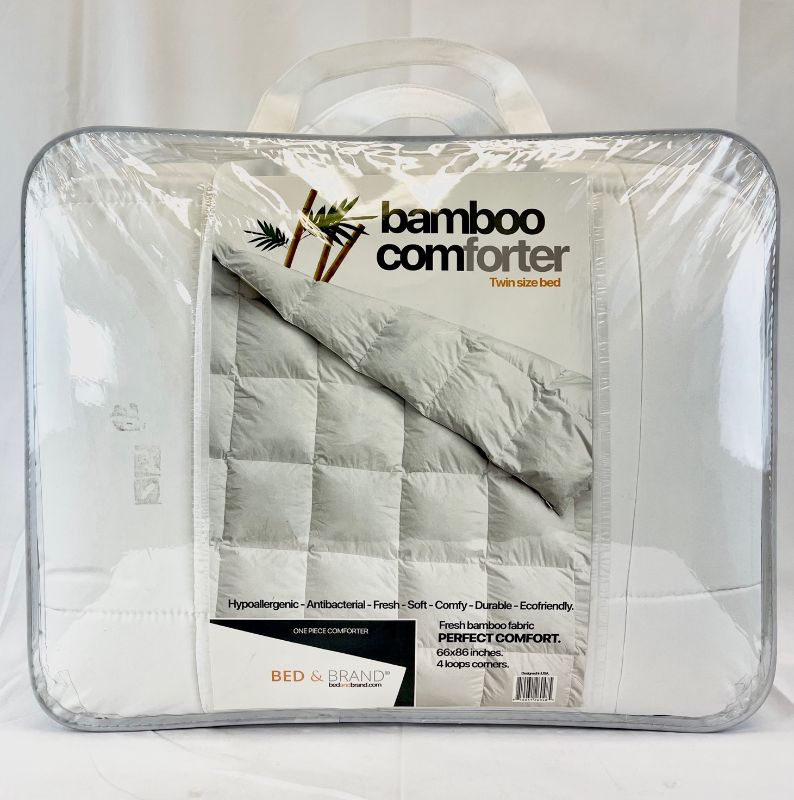 Photo 2 of BED AND BRAND BAMBOO TWIN COMFORTER SILKY SMOOTH FEEL CAN BE USED AS IS OR AS A DUVET COVER INSERT INCLUDES 4 SET OF TIES TO KEEP IN PLACE IF USED INSIDE A DUVET GSM FABRIC TEAR RESISTANT ANTIFUNGAL AND ANTI BACTERIA 5.2 POUNDS NEW$149.95