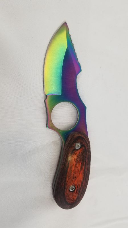 Photo 1 of 2.5 INCH BLAD OIL SLICK KNIFE NEW