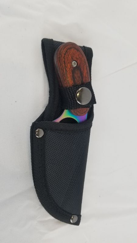 Photo 3 of 2.5 INCH BLAD OIL SLICK KNIFE NEW