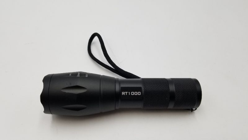 Photo 2 of BLACK LED FLASHLIGHT WITH ZOOM NEW