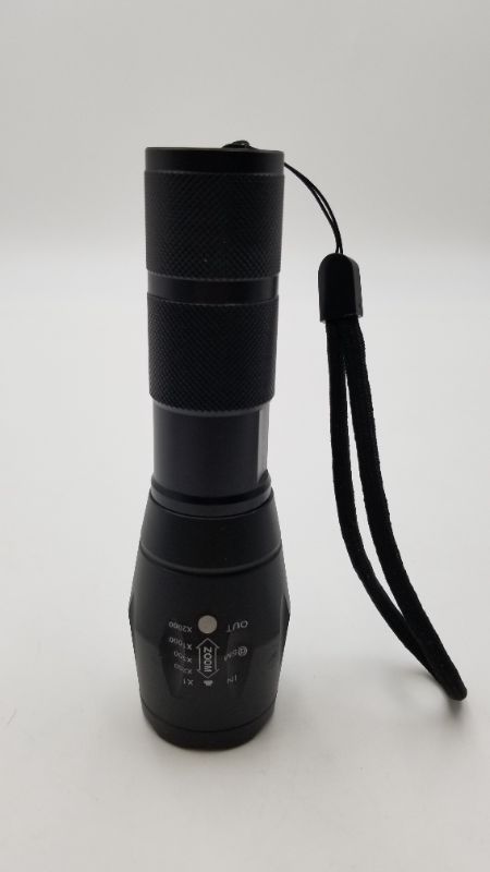 Photo 4 of BLACK LED FLASHLIGHT WITH ZOOM NEW