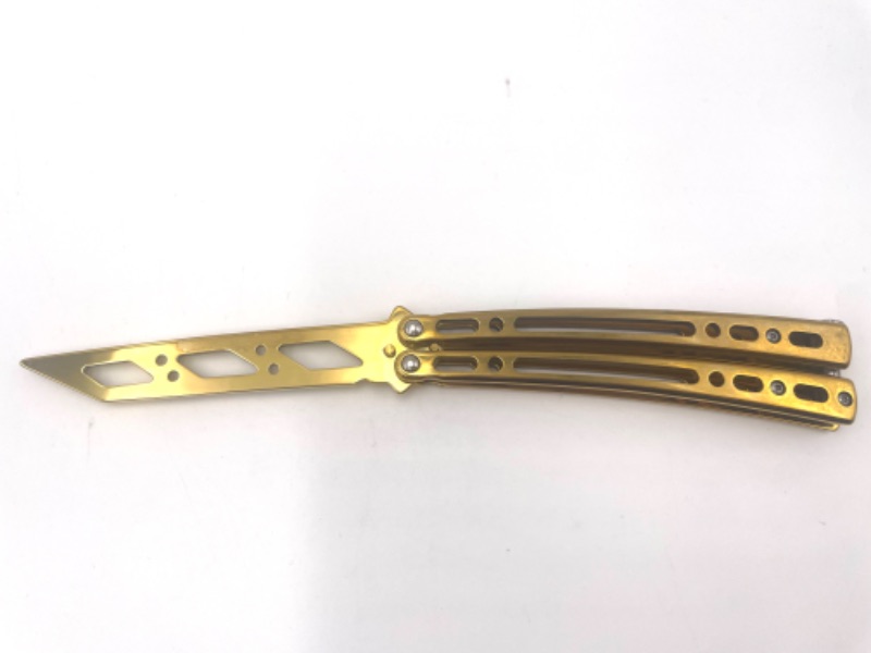 Photo 1 of GOLD PRACTICE BUTTERFLY KNIFE NEW 