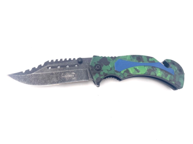 Photo 1 of GREEN CAMO WITH BLUE DETAIL POCKET KNIFE WITH SEATBELT CUTTER AND WINDOW BREAKER NEW 