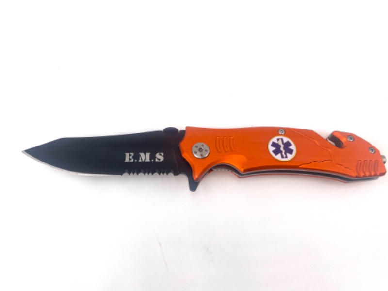 Photo 1 of ORANGE EMS POCKET KNIFE WITH WINDOW BREAKER AND SEATBELT CUTTER NEW 