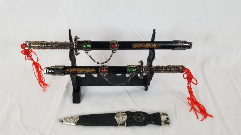 Photo 1 of MINI DIPLAY SWORDS WITH STAND MISSING FOOT AND BONUS KNIFE NEW