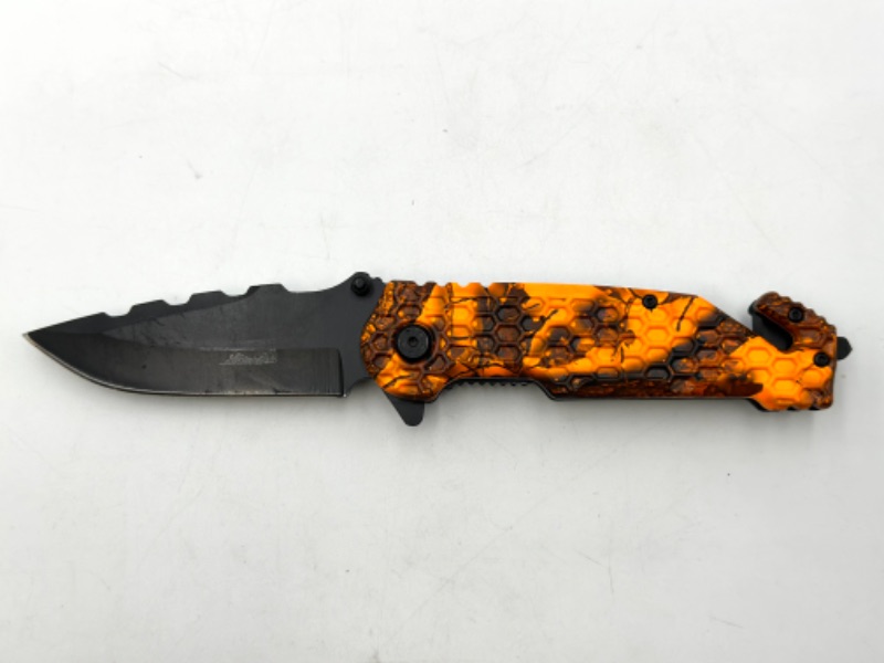 Photo 1 of ORANGE AND BLACK DETAILED POCKET KNIFE NEW