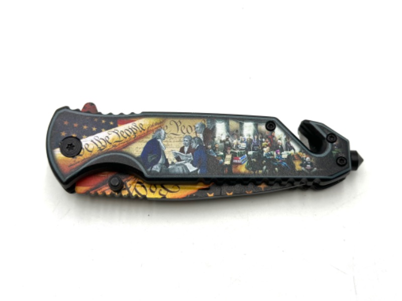 Photo 1 of WE THE PEOPLE USA AMERICA POCKET KNIFE WITH SEAT BELT CUTTER AND WINDOW BREAKER NEW