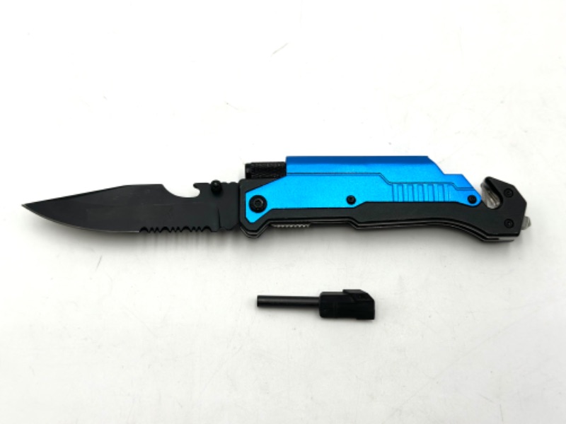 Photo 1 of BLUE DESIGNED POCKET KNIFE WITH SEAT BELT CUTTER WINDOW BREAKER SHARPENING TOOL AND FLASH LIGHT NEW