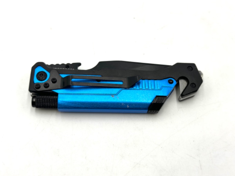 Photo 4 of BLUE DESIGNED POCKET KNIFE WITH SEAT BELT CUTTER WINDOW BREAKER SHARPENING TOOL AND FLASH LIGHT NEW