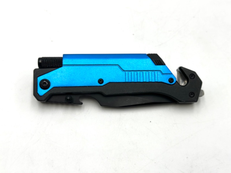 Photo 3 of BLUE DESIGNED POCKET KNIFE WITH SEAT BELT CUTTER WINDOW BREAKER SHARPENING TOOL AND FLASH LIGHT NEW