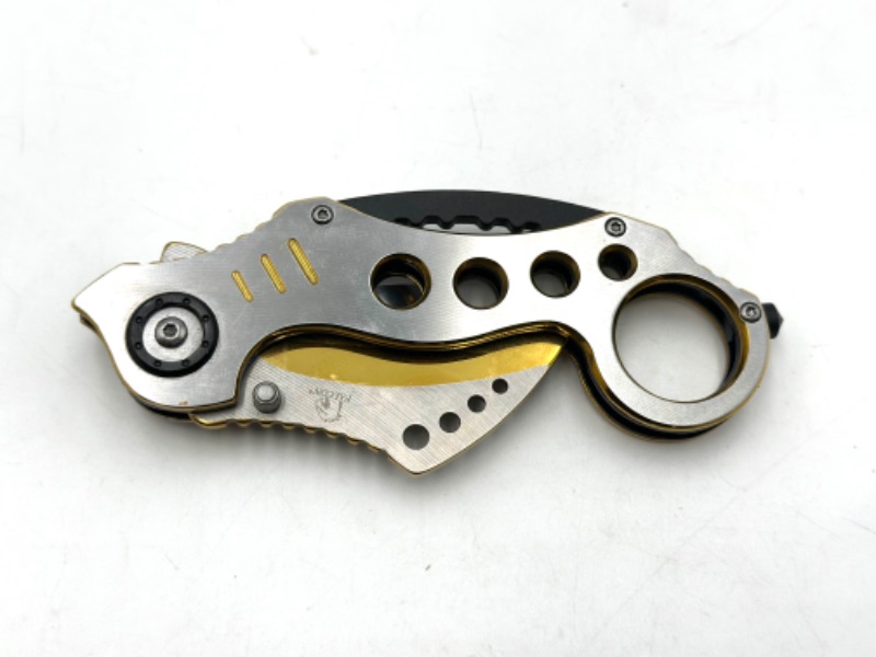 Photo 2 of INDUSTRIAL DESIGN FALCON POCKET KNIFE WITH WINDOW BREAKER KEYCHAIN LOOP HAND HOLDER NEW