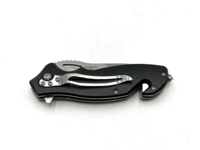 Photo 3 of SKULL AND MACHINERY DESIGN POCKET KNIFE WITH WINDOW BREAKER KEYCHAIN LOOP AND SEAT BELT CUTTER NEW