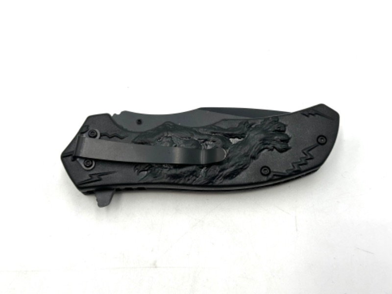 Photo 1 of RED WOLVERINE DESIGNED POCKET KNIFE NEW