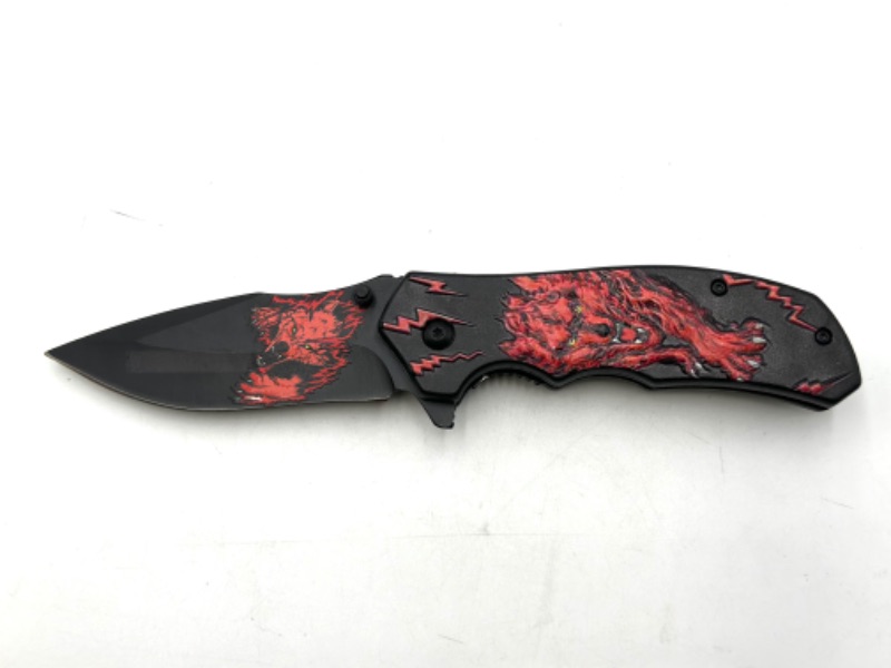 Photo 1 of RED WOLVERINE DESIGNED POCKET KNIFE NEW