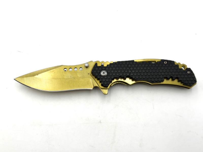 Photo 1 of GOLD AND BLACK DESIGNED POCKET KNIFE NEW