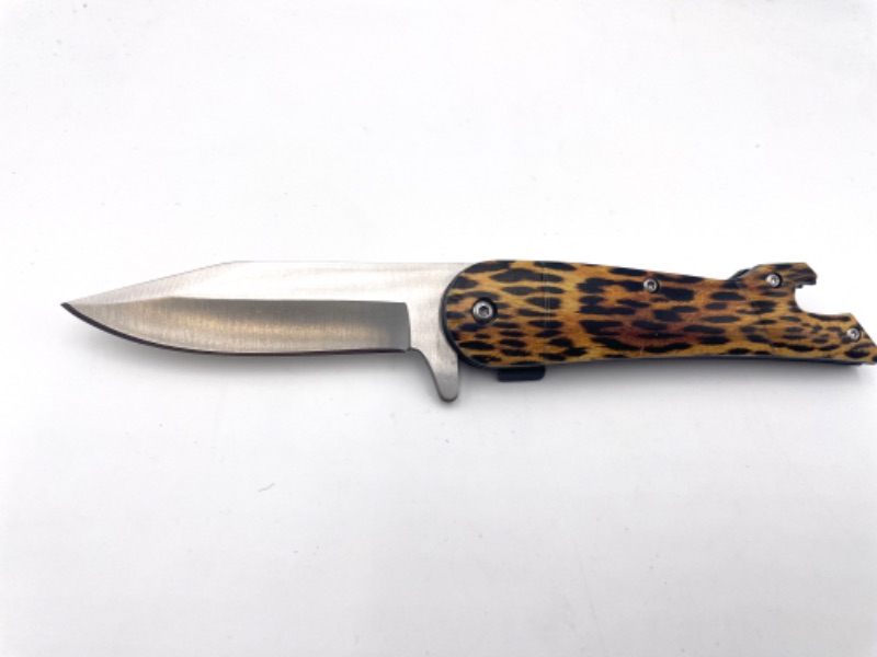 Photo 1 of CHEETAH PRINT POCKET KNIFE WITH BOTTLE OPENER AND CLIP NEW 