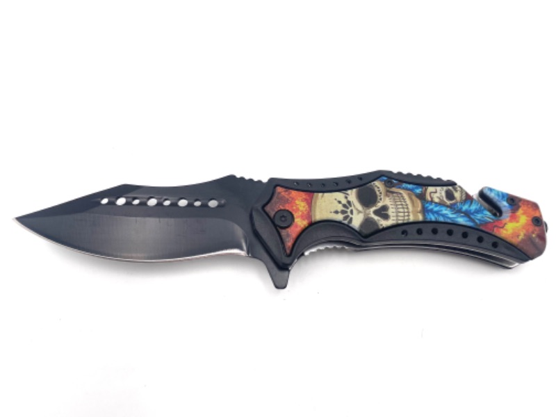 Photo 1 of DOUBLE SKULL FIRE AND FEATHERS WITH SEATBELT CUTTER POCKET KNIFE NEW 