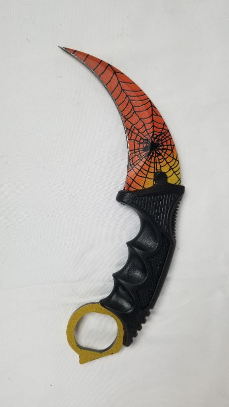Photo 1 of 7  INCH SPIDER CLAW KNIFE NEW