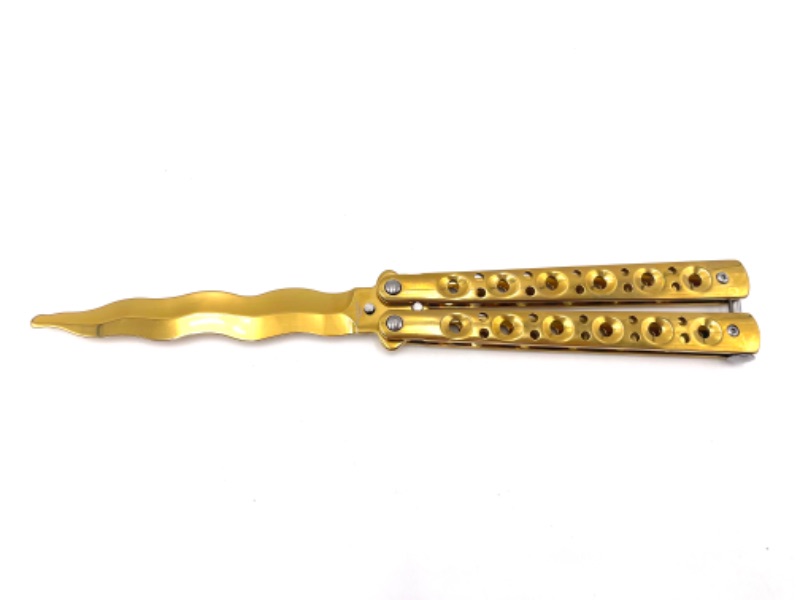 Photo 1 of GOLD BUTTERFLY PRACTICE KNIFE
WITH SWIGGLY BLADE NEW 