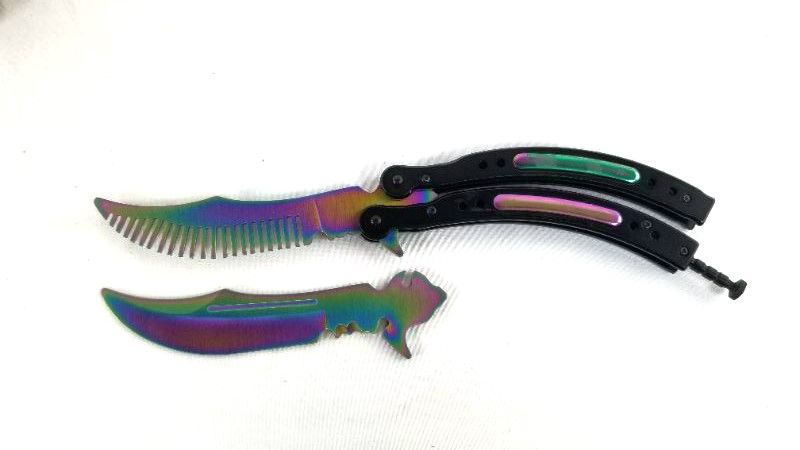 Photo 1 of INTERCHANGEABLE PRACTICE BUTTERFLY KNIFE AND COMB NEW 