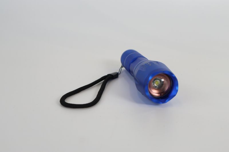 Photo 1 of BLUE TACTICAL FLASHLIGHT WITH ZOOM FEATURE NEW 