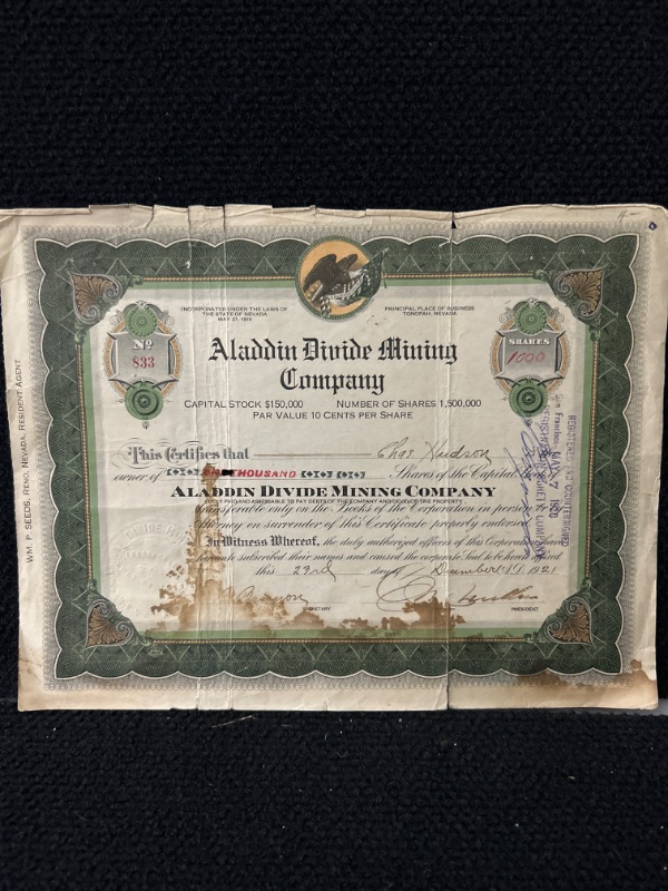 Photo 1 of Aladdin divide mining company Tonopah Nevada 1921 Stock certificate has stain and tear