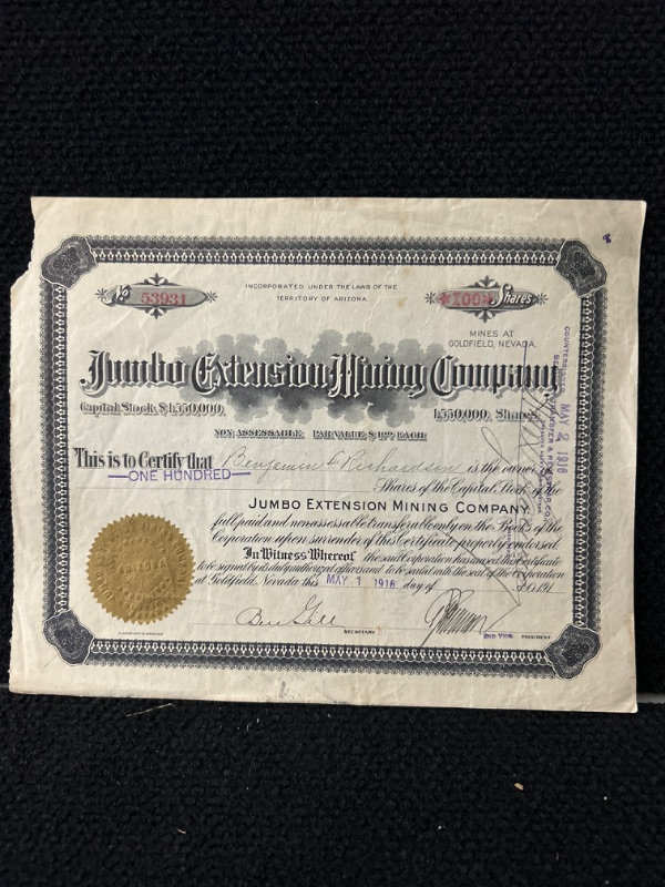 Photo 1 of Jumbo Extension  mining company stock certificate 1916 goldfield  Nevada torn corner 