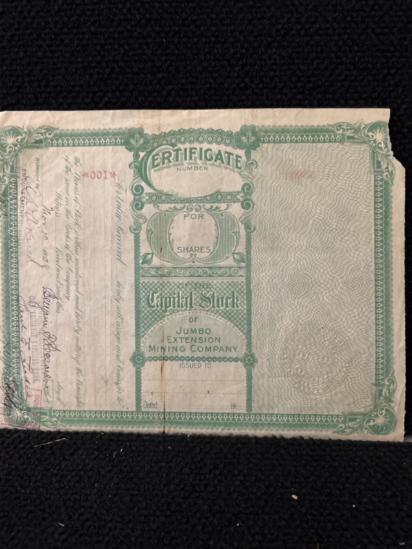 Photo 3 of Jumbo Extension  mining company stock certificate 1916 goldfield  Nevada torn corner 