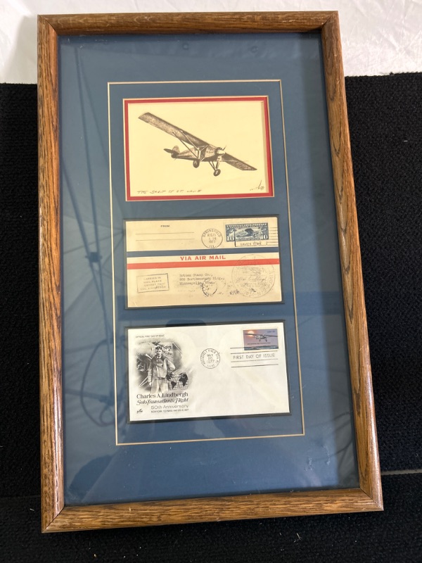 Photo 1 of Framed and matted Spirit of St Louis 1st day covers 1927 and 1977 with signed pencil drawing of plane in Oak frame