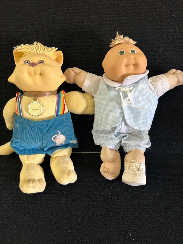 Photo 1 of Cabbage patch kids doll and Koosas Chester Doll missing one shoe and Chester  has stains on feet 