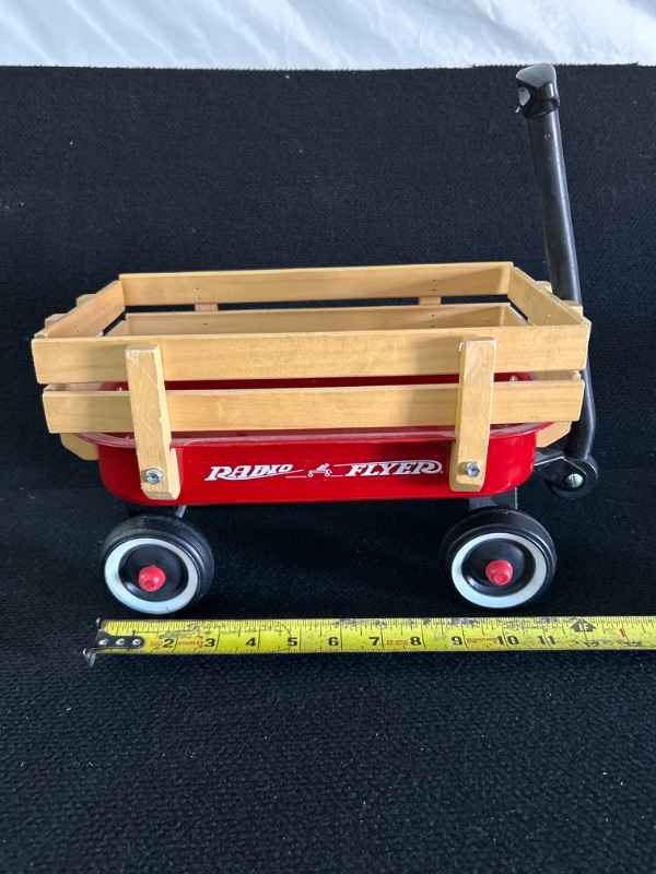 Photo 1 of Small display Radio Flyer wagon Measures appx 14 inches long by 8 inches tall like new condition 