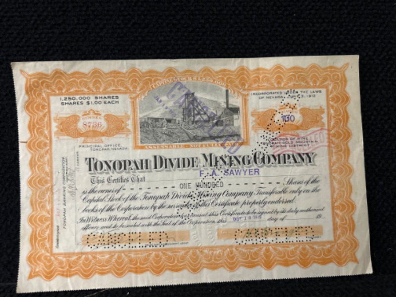 Photo 1 of Tonopah divide mining company stock 1919 Nevada with stamps on back  