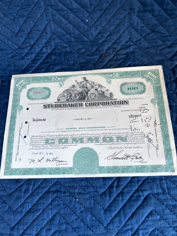 Photo 3 of two Studebaker stock certificates 1955 and 1963 