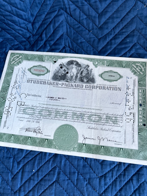 Photo 2 of two Studebaker stock certificates 1955 and 1963 