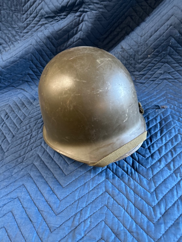 Photo 1 of Vintage World War II US Helmet with liner 