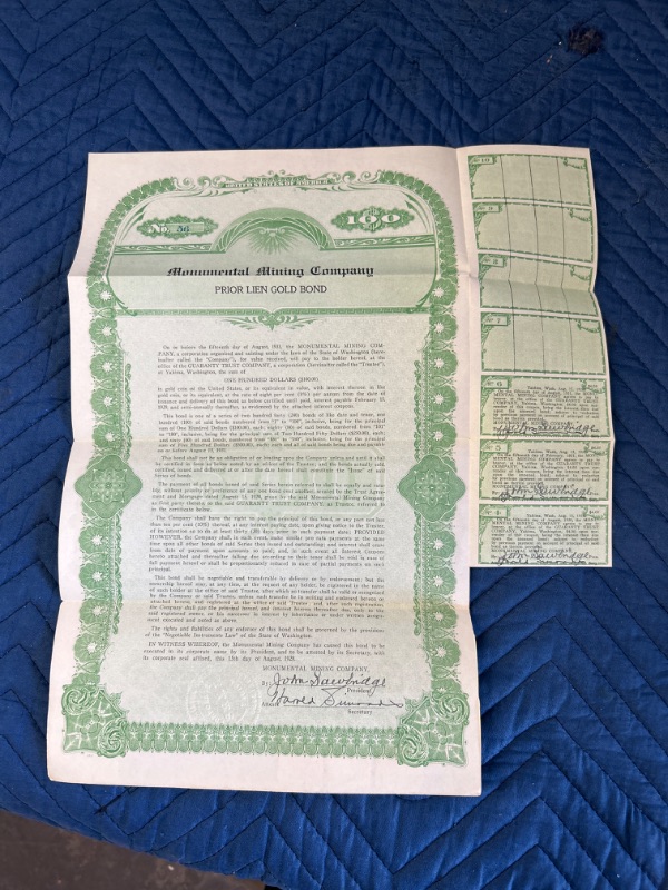 Photo 1 of $100 1928 Monumental mining company Prior Lien Gold Bond certificate with coupons and stamps 