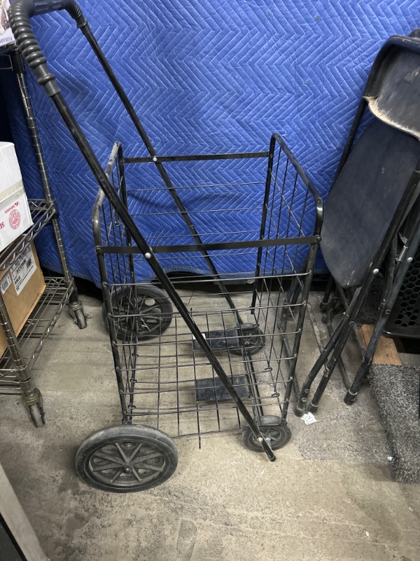 Photo 1 of 4 wheel fold up shopping cart Great shape 