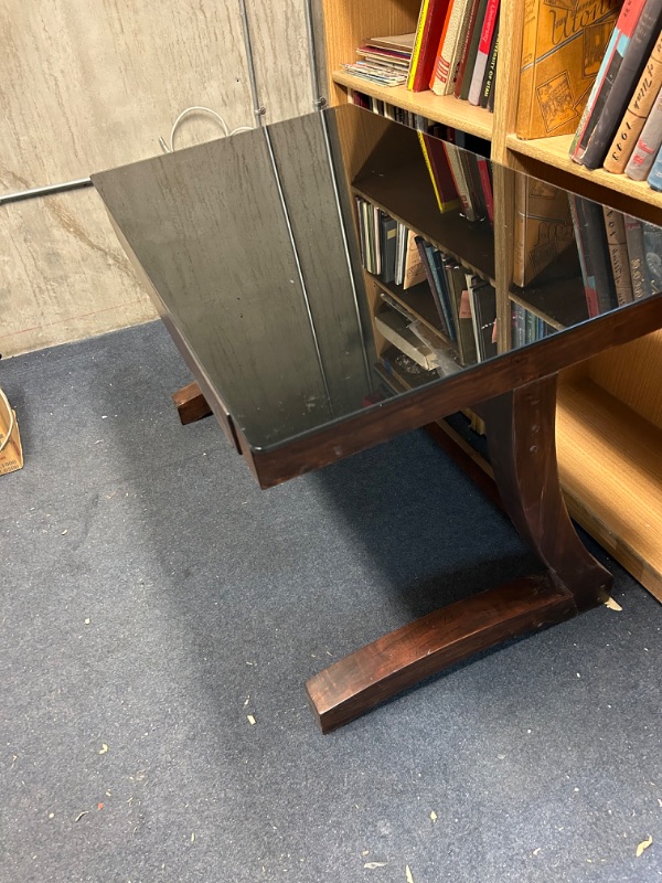 Photo 1 of Unique wooden desk with black glass top by Whalen 48 x 28 x 30 inches tall has a few scratches 