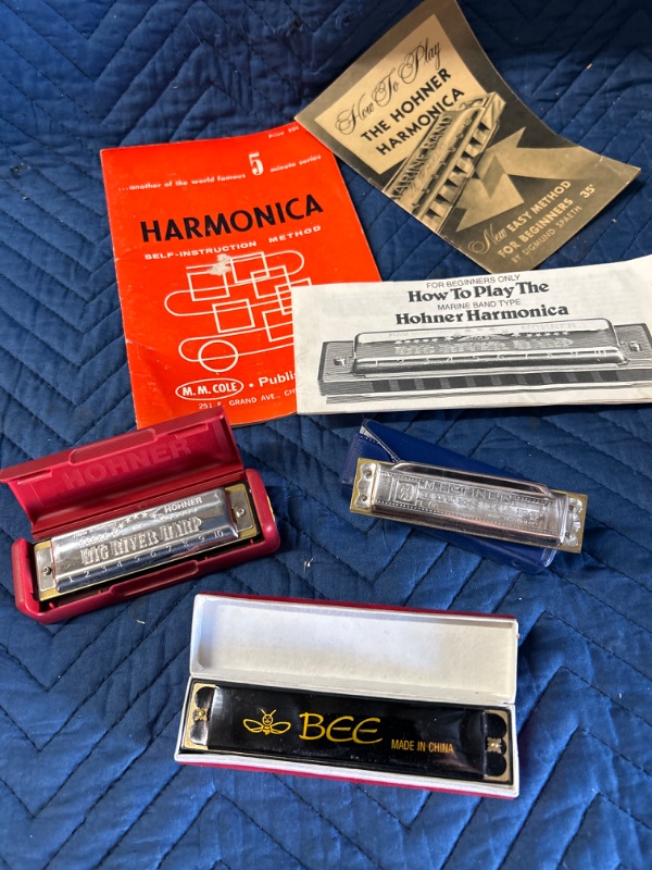 Photo 1 of 3 Harmonicas and learning books 