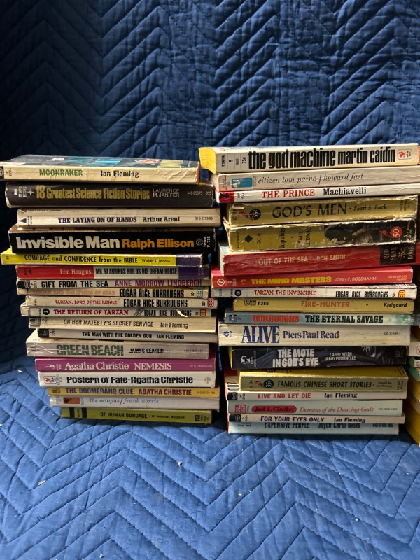 Photo 1 of Box full of paperback books 