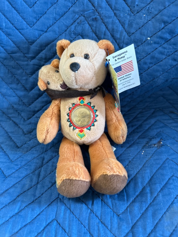 Photo 1 of Sacagawea and Pomp Dollar Bear with dollar 