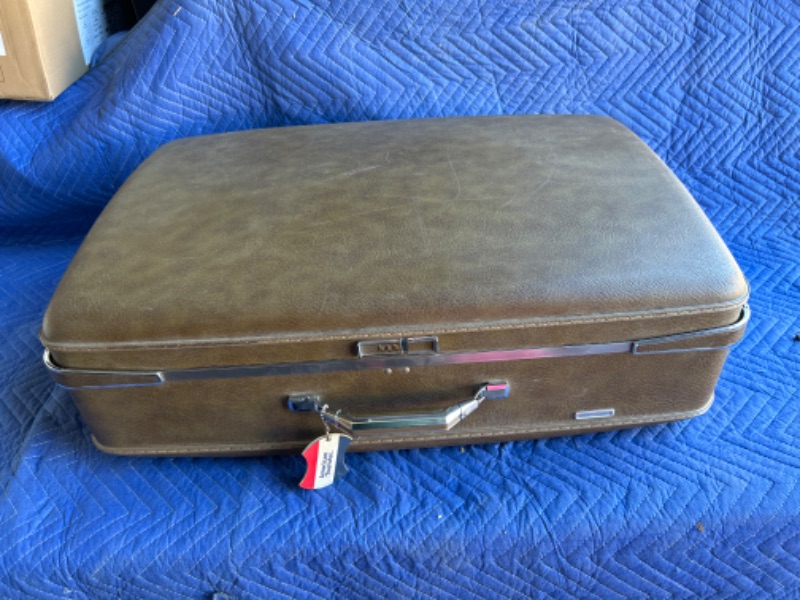 Photo 1 of Large Vintage American Tourister Brown Suitcase measures 30 x 20 x 9 combo is 000