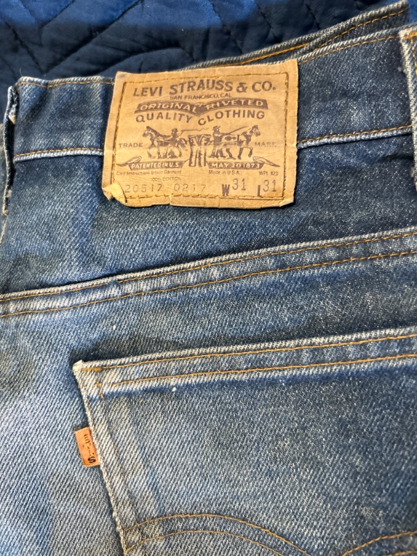 Photo 2 of Vintage orange tag Levi's tag says 31x31 