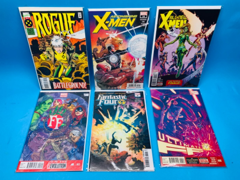 Photo 1 of 461576… x-Men and fantastic four comics in plastic sleeves
