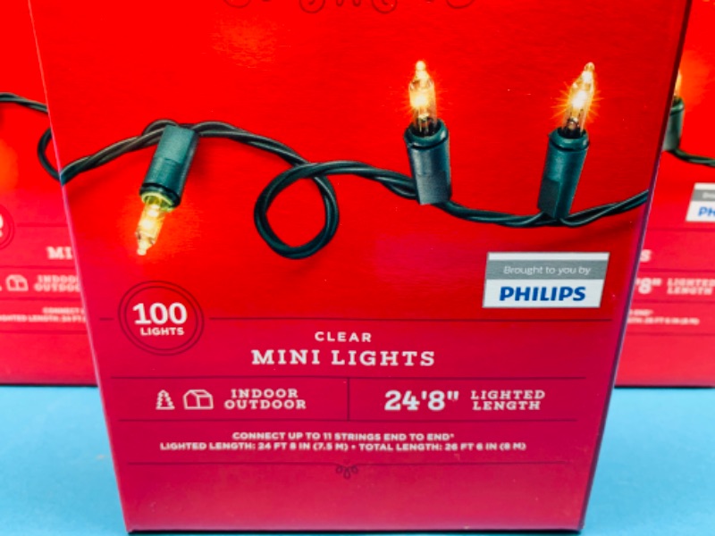 Photo 1 of 462077… 4 boxes of clear mini lights 100 lights per box  24’ 8” length per box 
